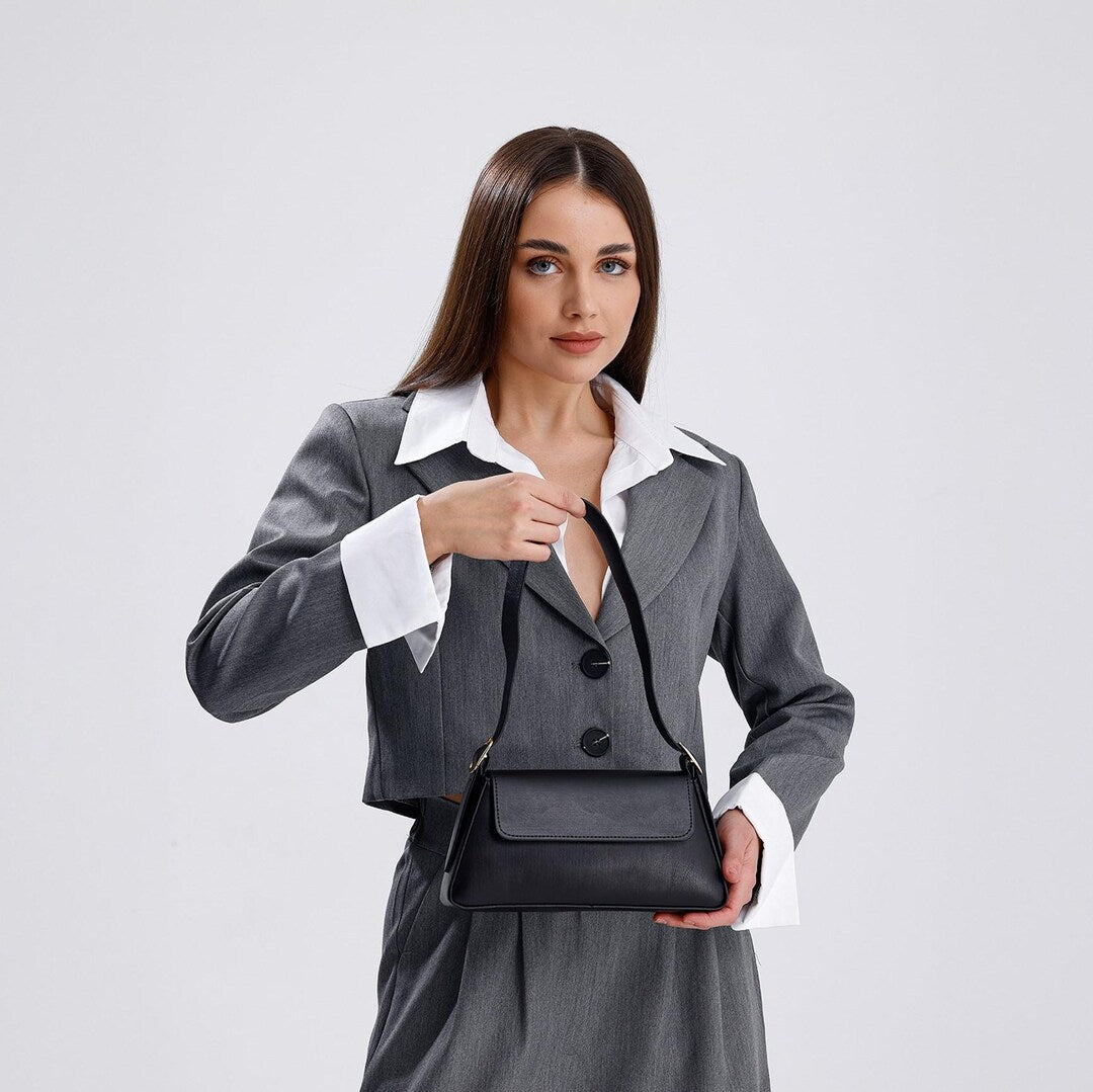 The $149 East-West Bag That Starts More Conversations Than Any Other Bag We Own