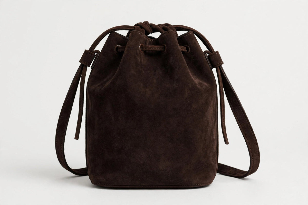 How to Style a Bucket Bag Without Looking Like You're Headed to the Beach